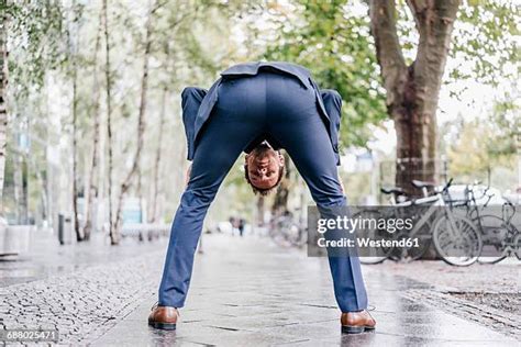 239 Men Bending Over Rear View Stock Photos & High